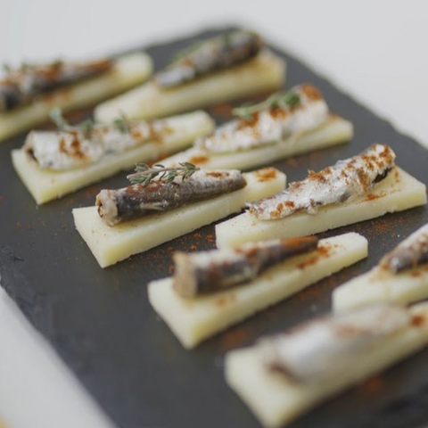 Sardines Over Manchego Bed